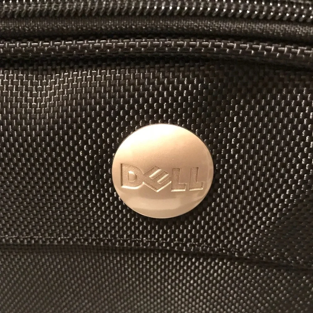 Dell laptop and office briefcase 💼